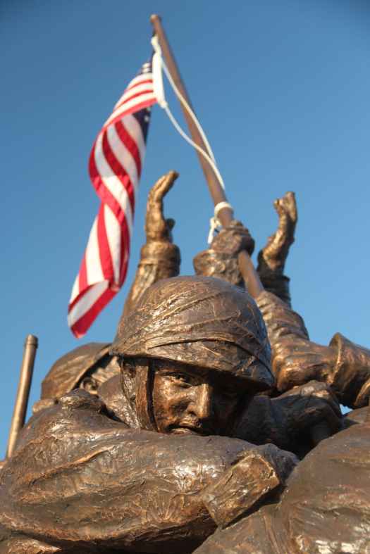 American Soldier Statue with flag