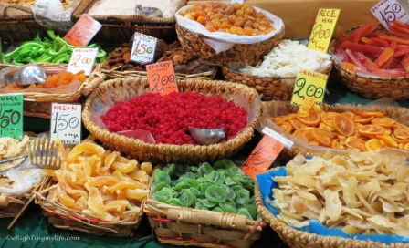 colorful display of dried food in baskets